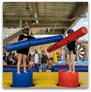 Children playing with foam bats