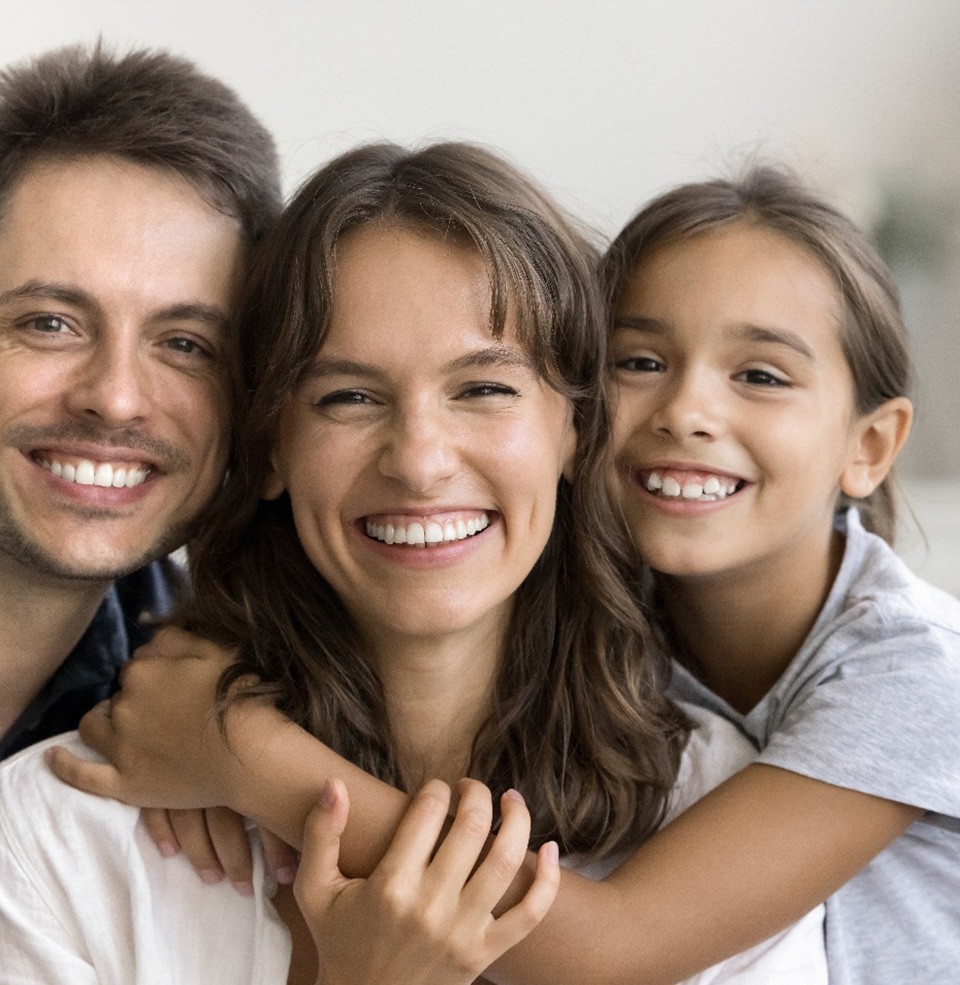 a family smiling 