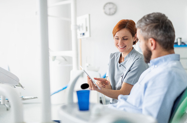 Worcester orthodontist explaining cost of Invisalign