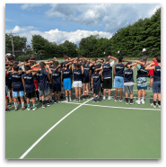 Group of children on a tennis court