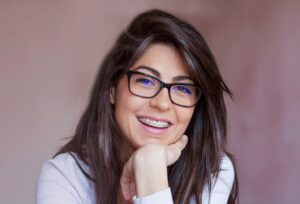 young woman with glasses and braces